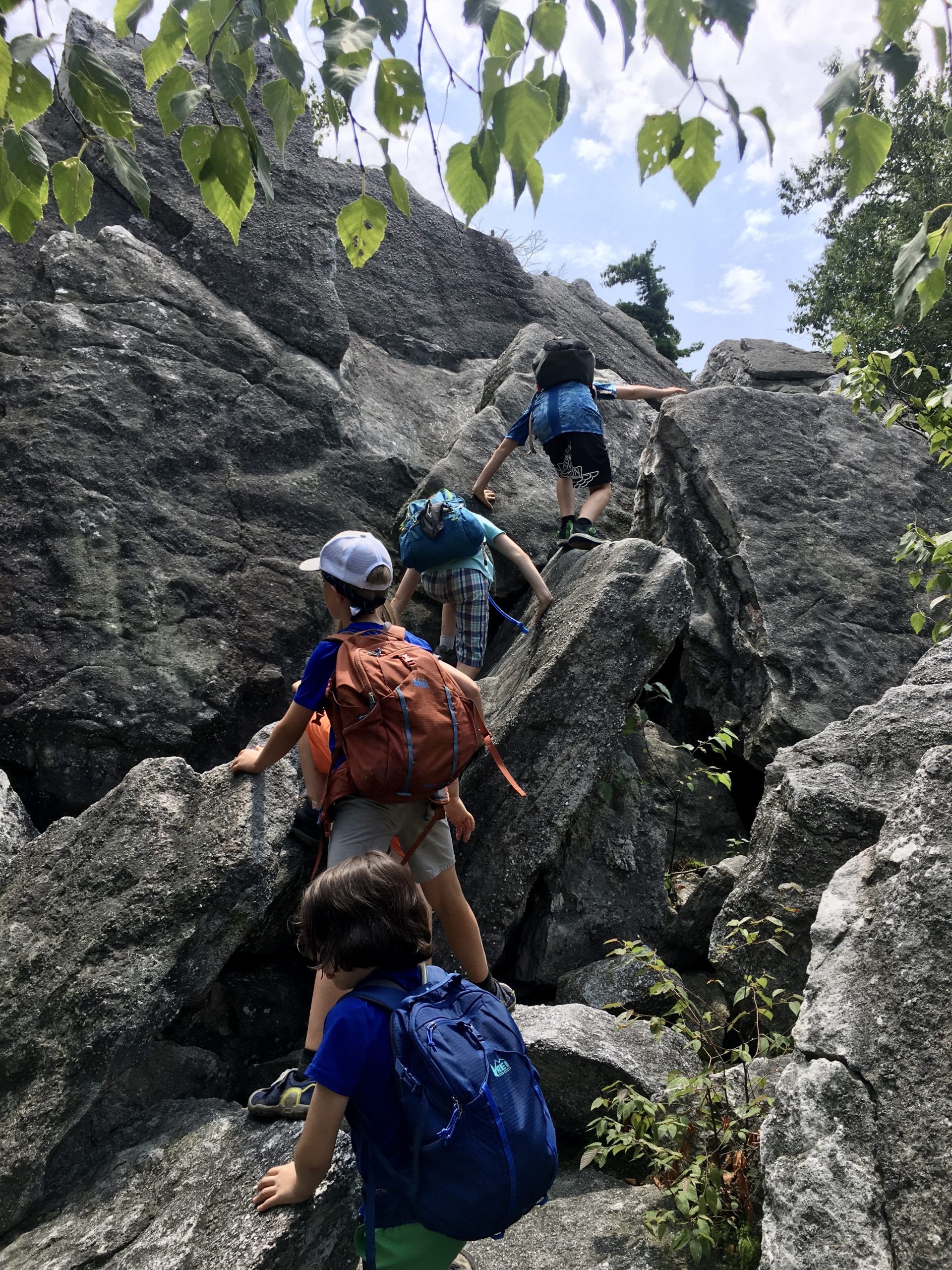 Rock Scramble group going up Bonticou Crag